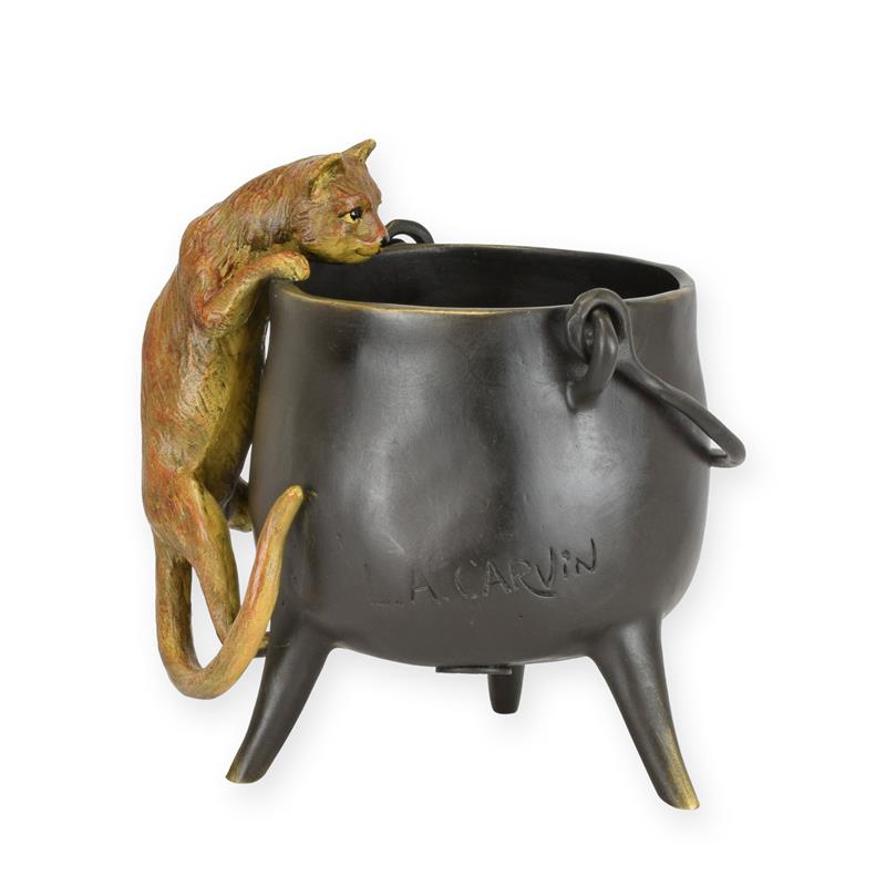 A\u0020BRONZE\u0020SCULPTURE\u0020OF\u0020A\u0020CAT\u0020CLIMBING\u0020IN\u0020A\u0020POT