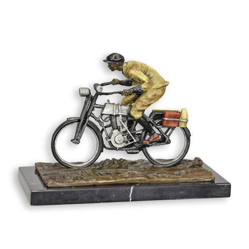 A\u0020BRONZE\u0020SCULPTURE\u0020OF\u0020A\u0020MAN\u0020ON\u0020A\u0020BIKE