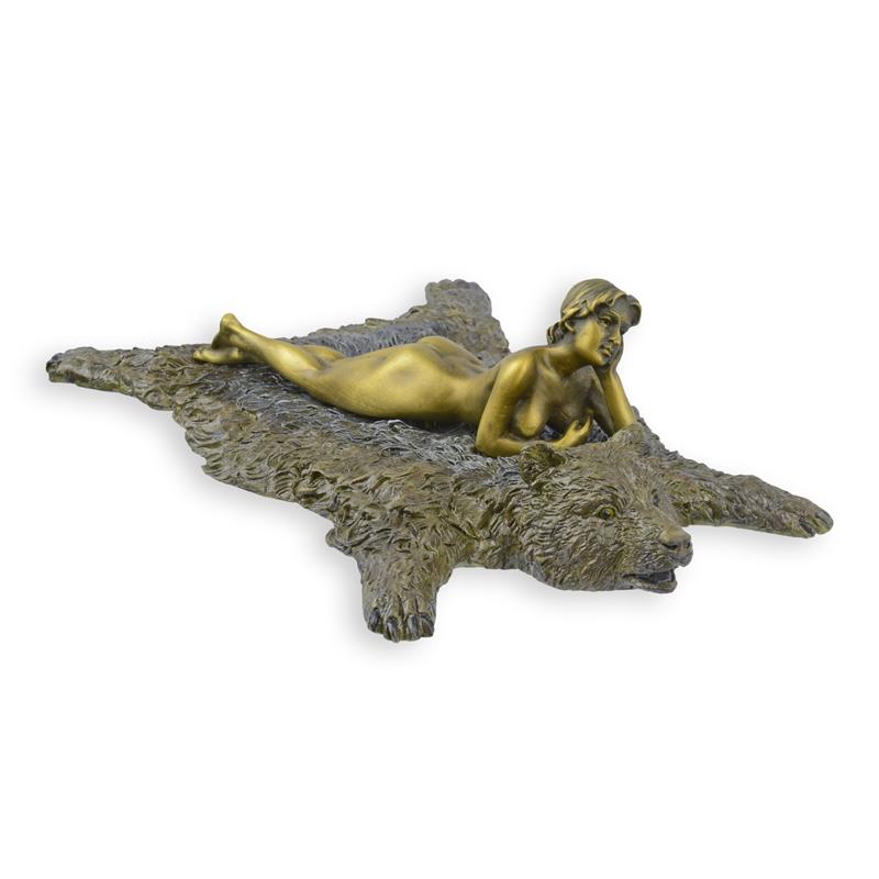 A\u0020BRONZE\u0020SCULPTURE\u0020OF\u0020A\u0020WOMAN\u0020ON\u0020A\u0020BEAR\u0020SKIN