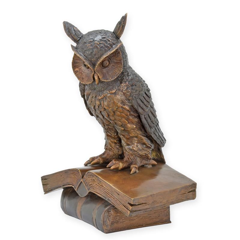 A\u0020BRONZE\u0020SCULPTURE\u0020OF\u0020THE\u0020WISE\u0020OWL\u0020SITTING\u0020ON\u0020A\u0020BOOK