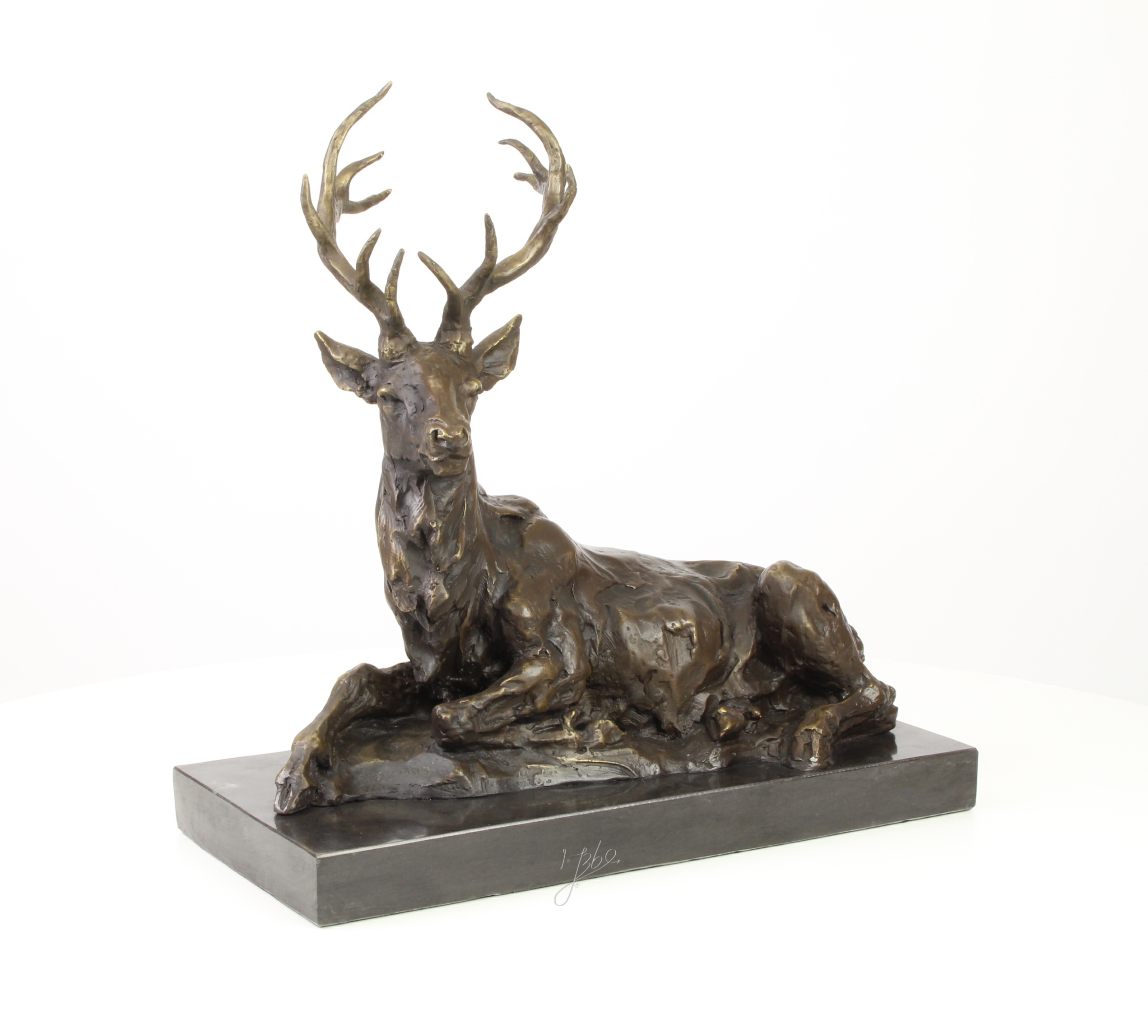 A\u0020BRONZE\u0020SCULPTURE\u0020OF\u0020A\u0020RECLINING\u0020DEER
