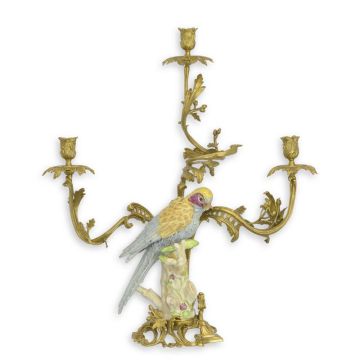 A THREE-BRANCH BRONZE MOUNTED PORCELAIN PARROT CANDLE HOLDER