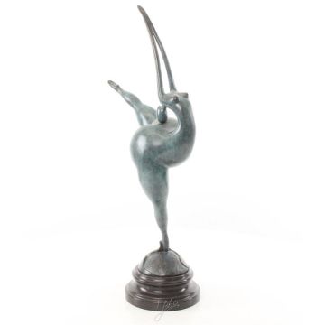 A MODERNIST BRONZE SCULPTURE OF A NUDE FEMALE DANCER