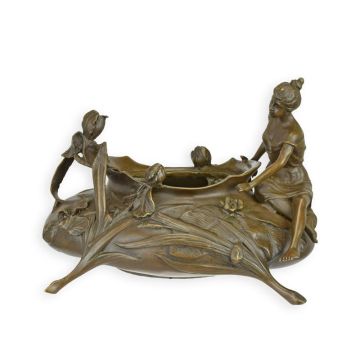 A BRONZE BOWL WITH WOMAN WITH ROSES