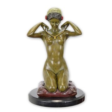 A BRONZE SCULPTURE CALLED NEW NECKLACE