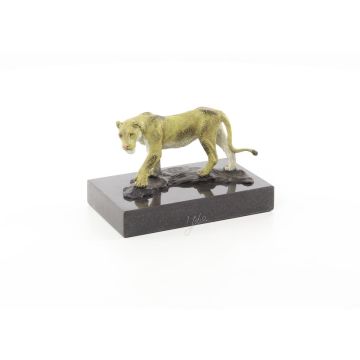 A BRONZE SCULPTURE OF A LIONESS