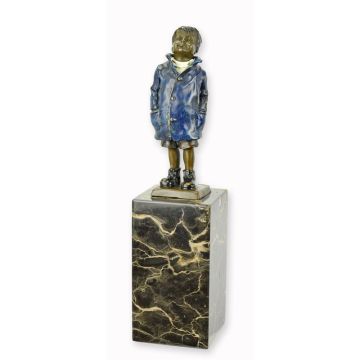 A BRONZE SCULPTURE OF A BOY