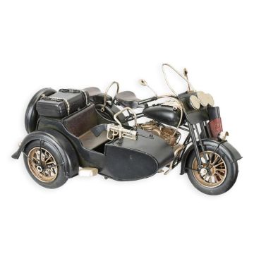 A TIN MODEL OF A MILITARY MOTORCYLE WITH SIDECAR