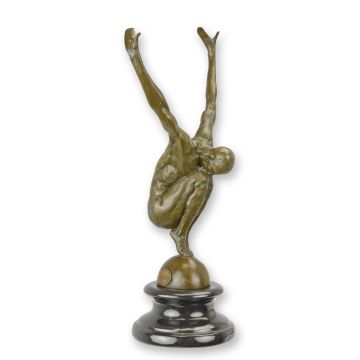 A BRONZE SCULPTURE OF A MALE NUDE IN DIVING POSITION