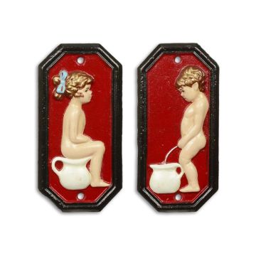 A PAIR OF CAST IRON BOY AND GIRL TOILET PLAQUES - RED