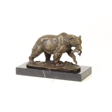 A BRONZE SCULPTURE OF A GRIZZLY BEAR