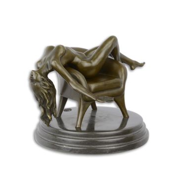 AN EROTIC BRONZE SCULPTURE OF A RECLINING FEMALE NUDE