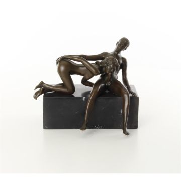 AN EROTIC BRONZE SCULPTURE OF A NUDE COUPLE