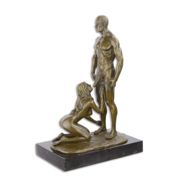 AN EROTIC BRONZE SCULPTURE OF A FEMALE GIVING ORAL SEX