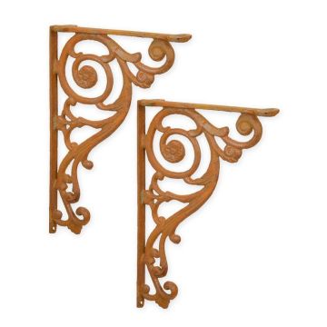 A PAIR OF CAST IRON WALL BRACKETS - RUSTY