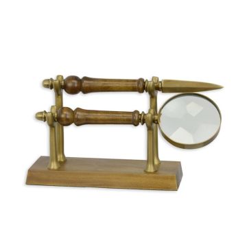 A MAGNIFYING GLASS AND OPENENER ON A STAND
