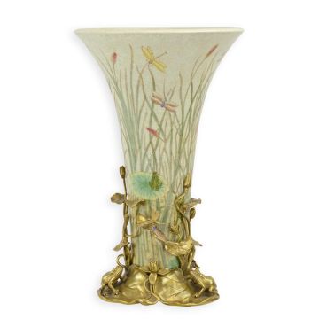 A BRONZE MOUNTED PORCELAIN VASE