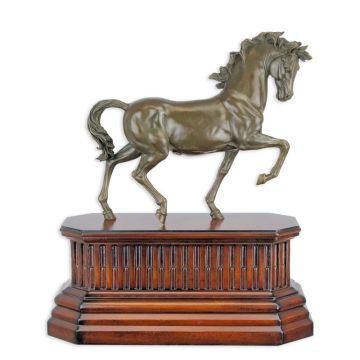 A BRONZE SCULPTURE OF TROTTING HORSE MOUNTED ON WOODEN BASE