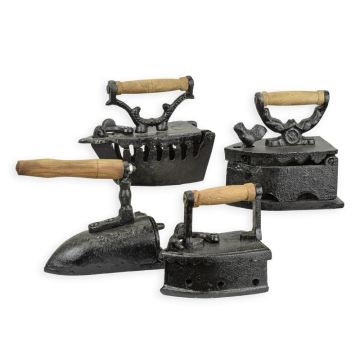 A SET OF 4 CAST IRON FLAT IRONS