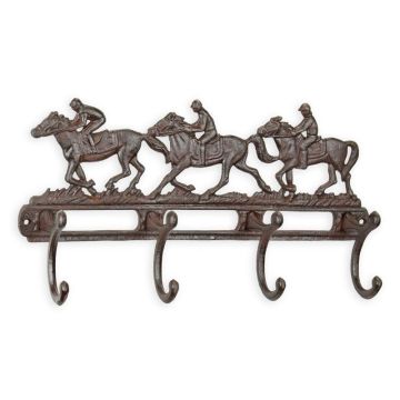 A PAIR OF CAST IRON COAT HOOKS