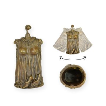 A BRONZE TABLE BELL OF AN UNDRESSED WOMAN