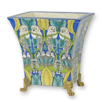 A BRONZE MOUNTED PORCELAIN PLANTER