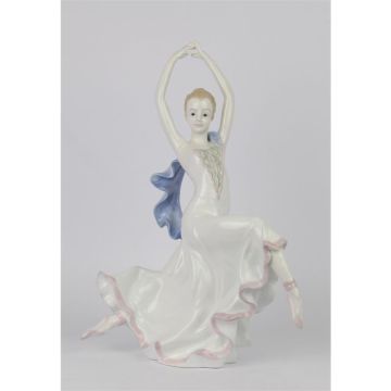 A PORCELAIN FIGURINE OF A DANCER