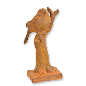 A RUSTY CAST IRON FIGURINE OF A SPARROW ON BRANCH
