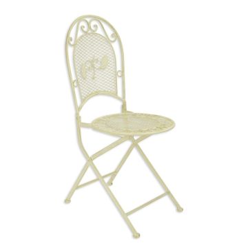 A WHITE IRON FOLDING CHAIR