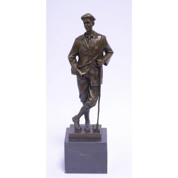 A BRONZE SCULPTURE OF A GOLFER