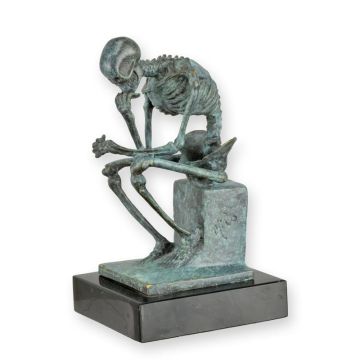 A BRONZE SCULPTURE OF THE GREEN SKELETON THINKER