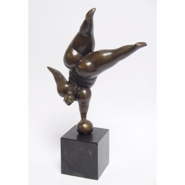 A MODERNIST BRONZE SCULPTURE OF A BALANCING LADY