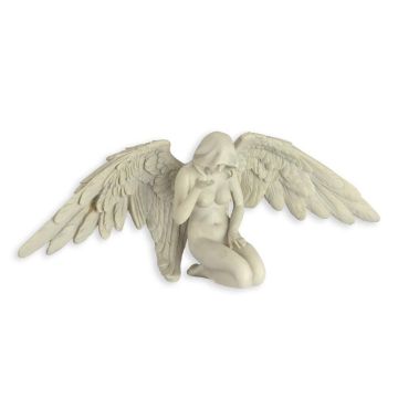 A RESIN FIGURINE OF A HOODED ANGEL