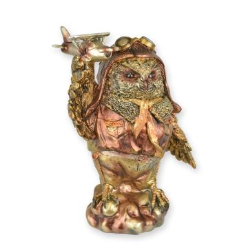 A RESIN STEAMPUNK FIGURINE OF AN OWL WITH AIRPLANE