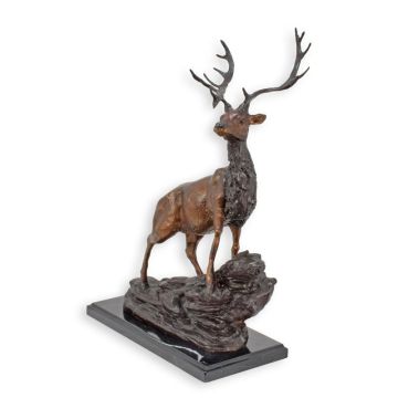 A BRONZE SCULPTURE OF A DEER ON A MARBLE BASE