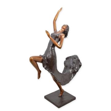 A BRONZE SCULPTURE OF A DANCING DRESSED LADY