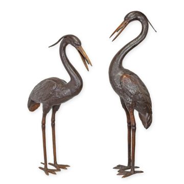 A BRONZE SCULPTURE OF A HERON