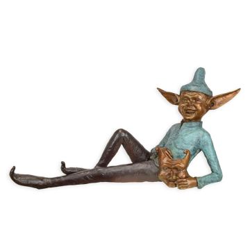 A BRONZE SCULPTURE OF A GOBLIN HOLDING A MASK