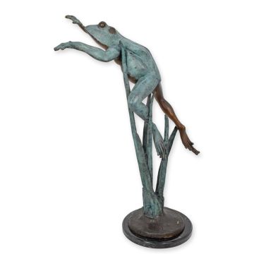 A BRONZE SCULPTURE OF A LEAPING FROG