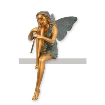 A BRONZE SCULPTURE OF A STTING FAIRY PLAYING FLUTE