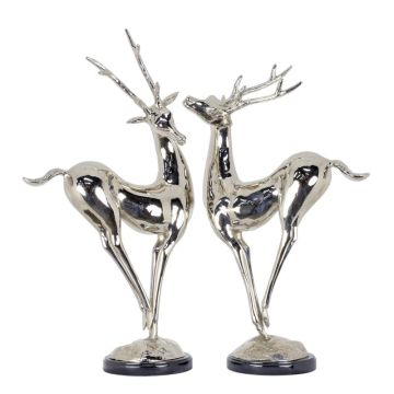 A PAIR OF NICKEL PLATED BRONZE DEER