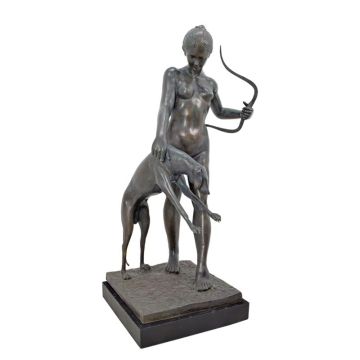 A BRONZE SCULPTURE OF DIANA WITH HOUND