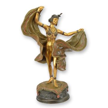 A BRONZE SCULPTURE OF A DANCER