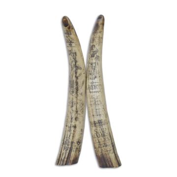 A RESIN SCRIMSHAW WHALE TOOTH