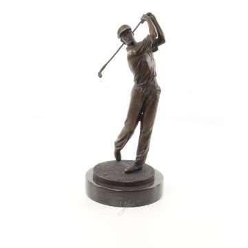 A BRONZE SCULPTURE OF A GOLFER